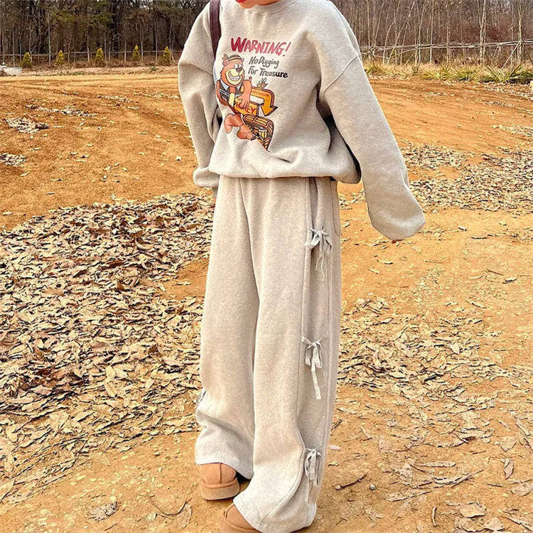 Pantalon ample à nœuds latéraux style urbain