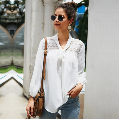 Blouse fluide à nœud col et empiècement dentelle