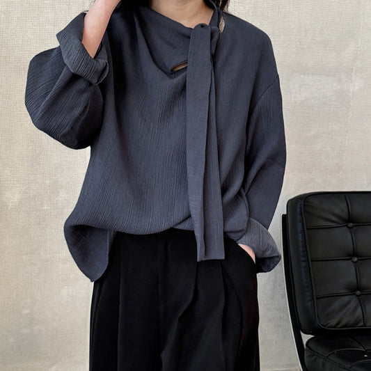 Blouse texturée à col noué élégant