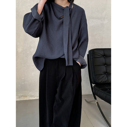 Blouse texturée à col noué élégant