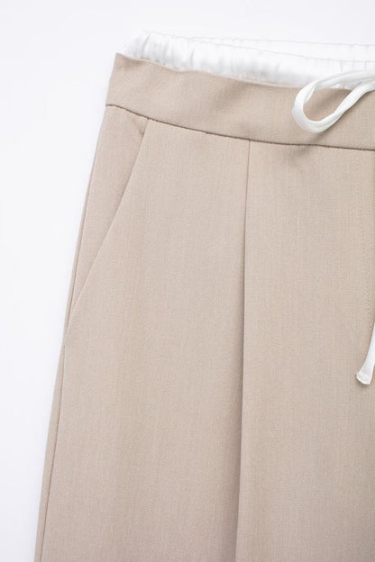 Pantalon taille haute large coupe élégante