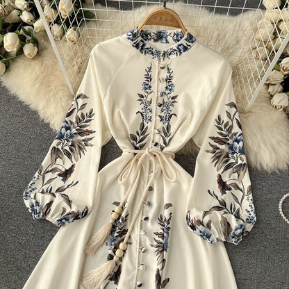 Robe longue imprimée style rétro ceinturée